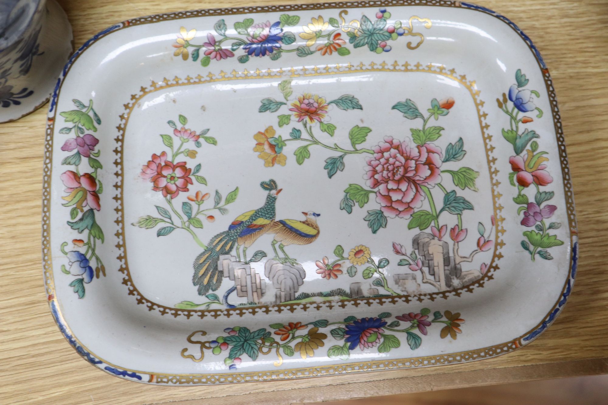 Three blue and white meat platters, largest 49cm wide, two ironstone plates and a tureen and a Delft vase